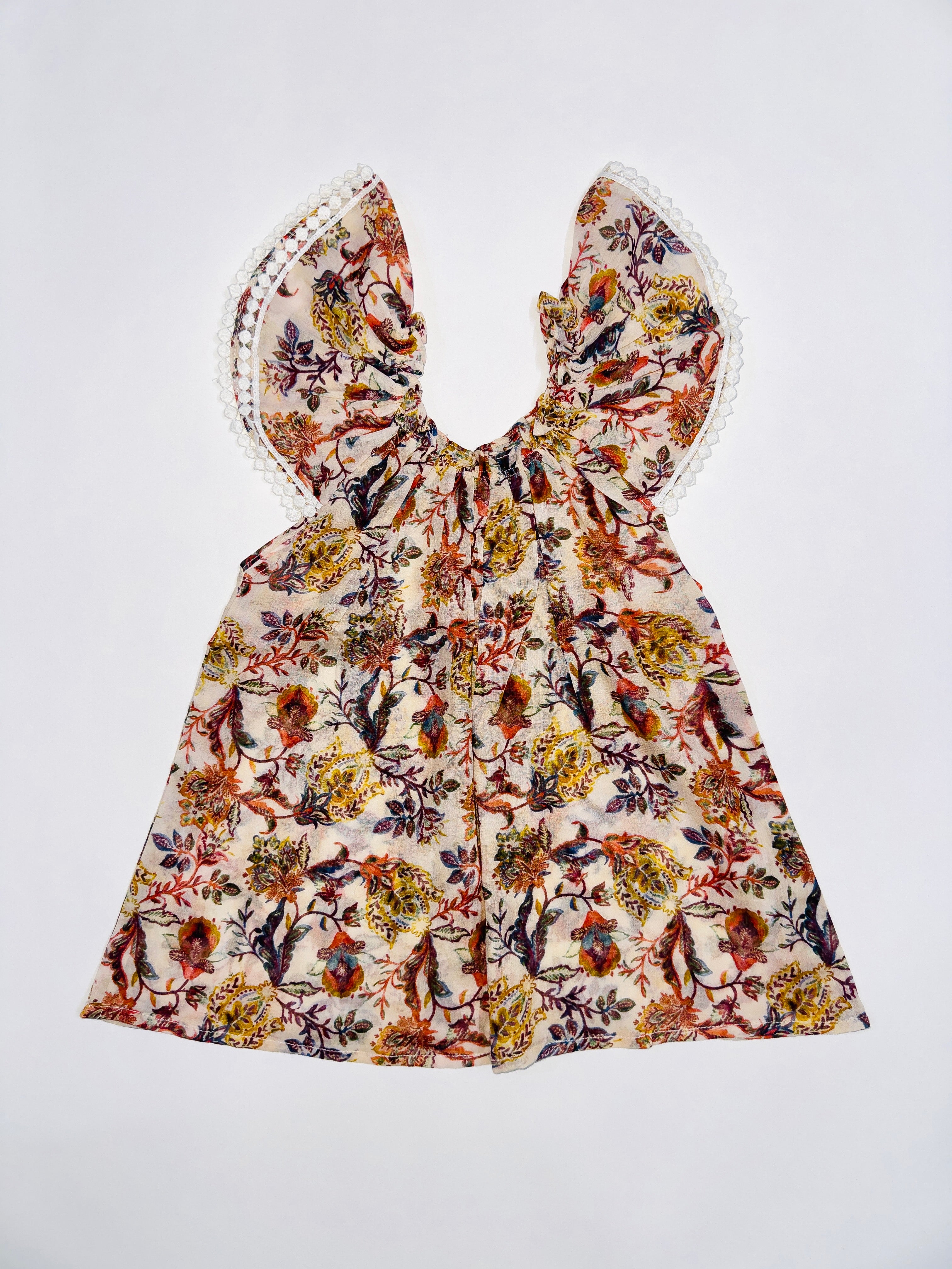 Golden Blossom Frock for Girls with Floral Designs, Lace Sleeves, and Breathable Fabric.