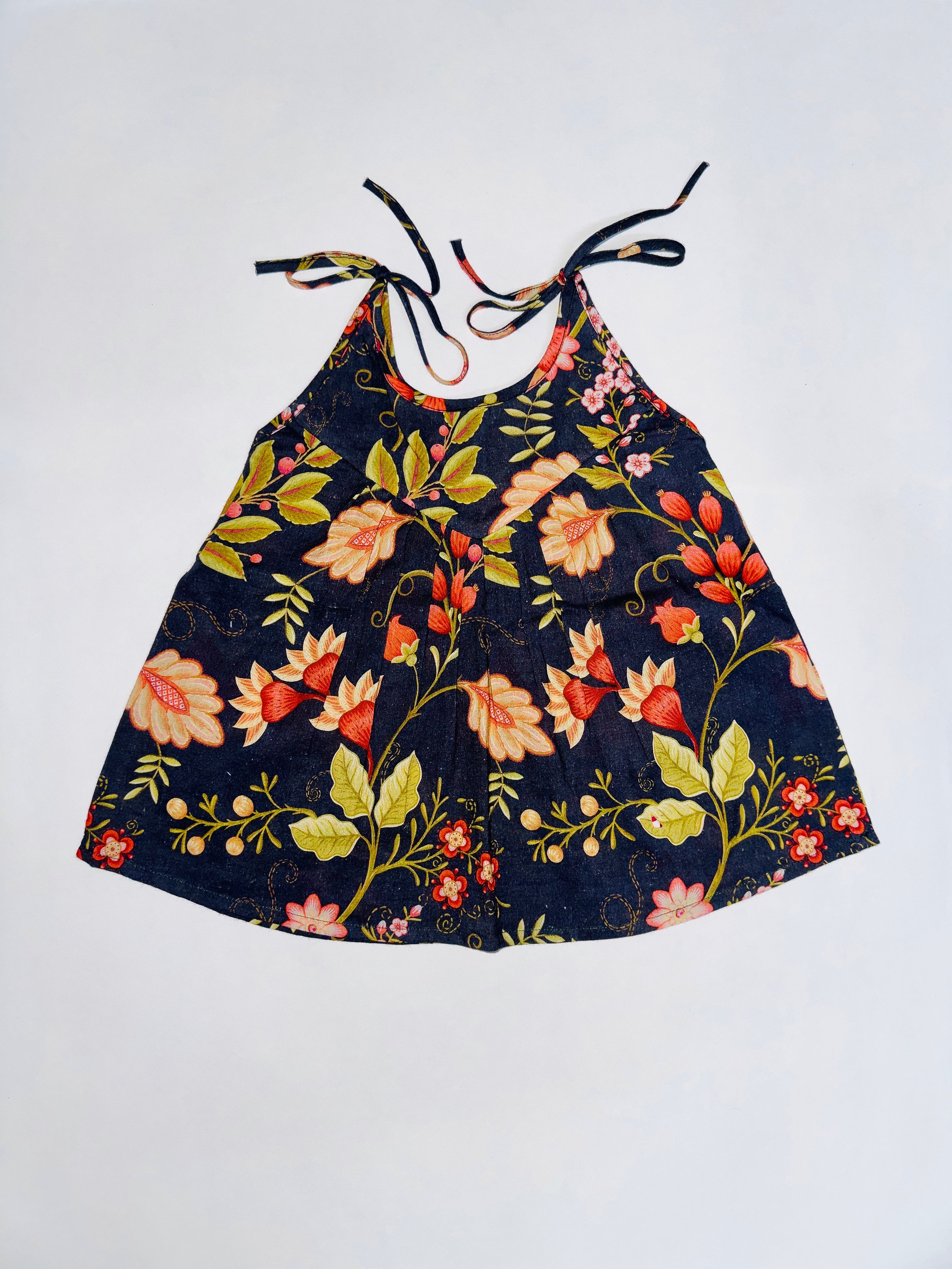 Dark floral printed cotton top for baby girl