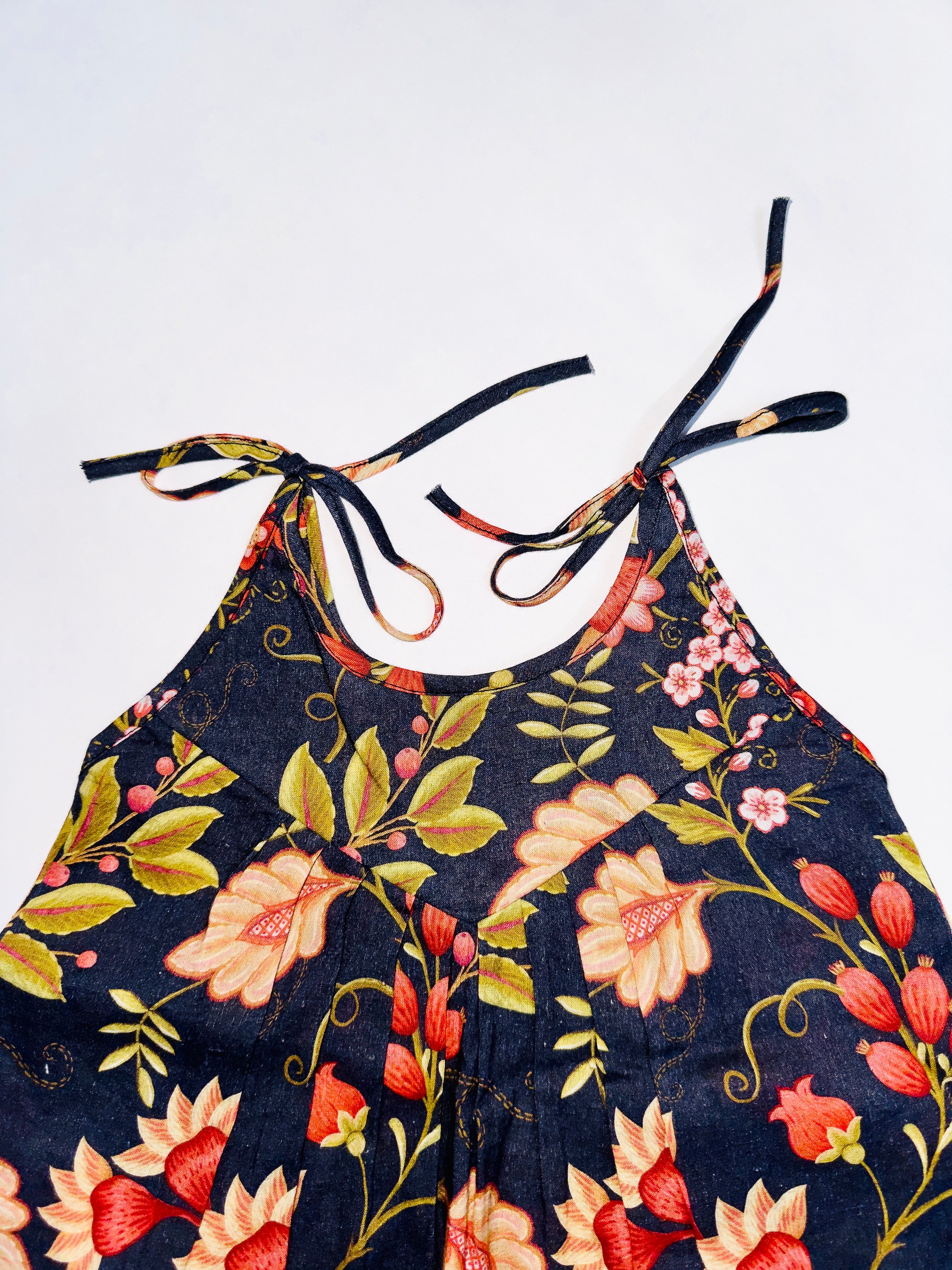 Dark floral printed cotton top for baby girl