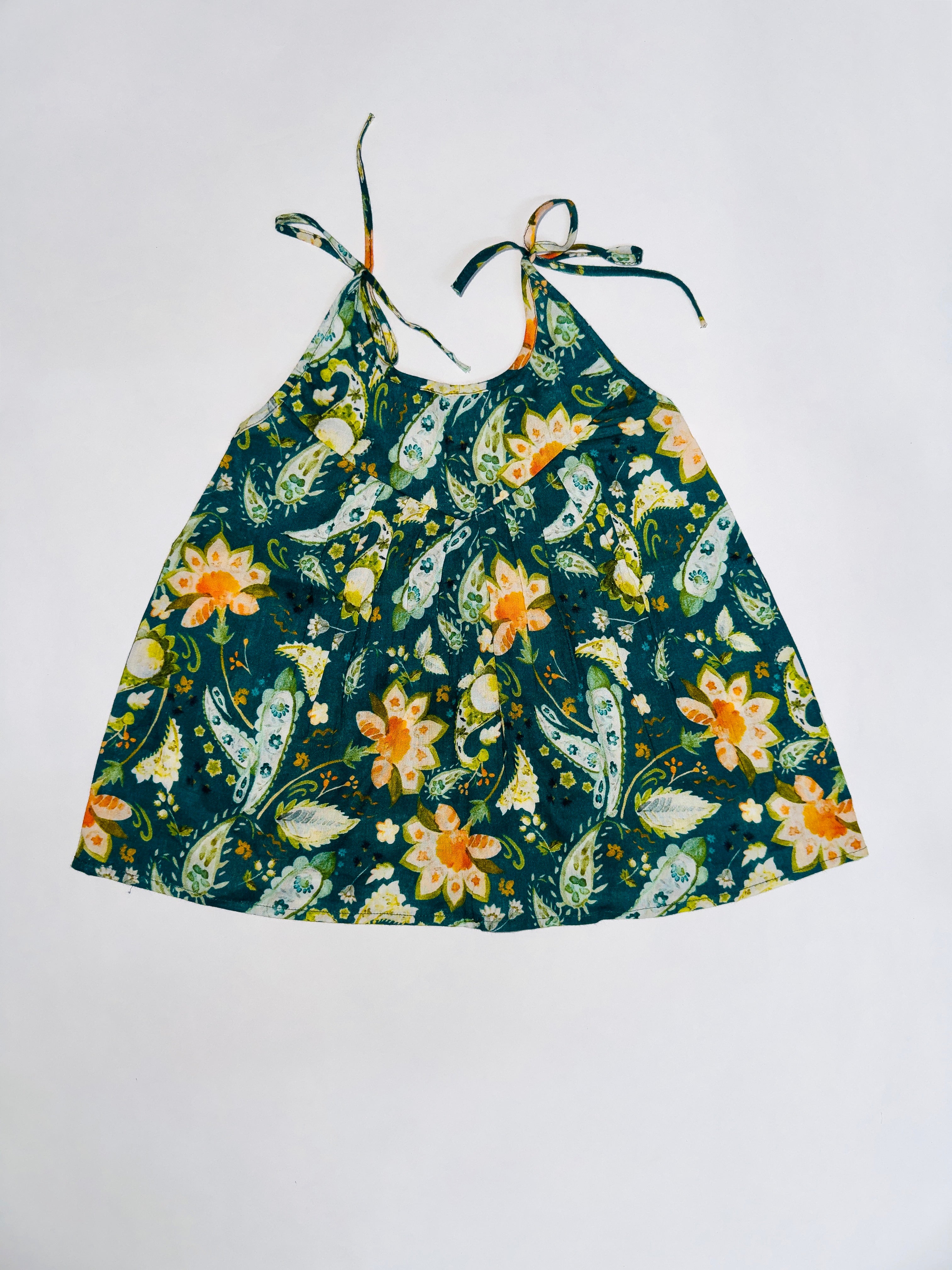 Sleeveless baby girl top with tropical print