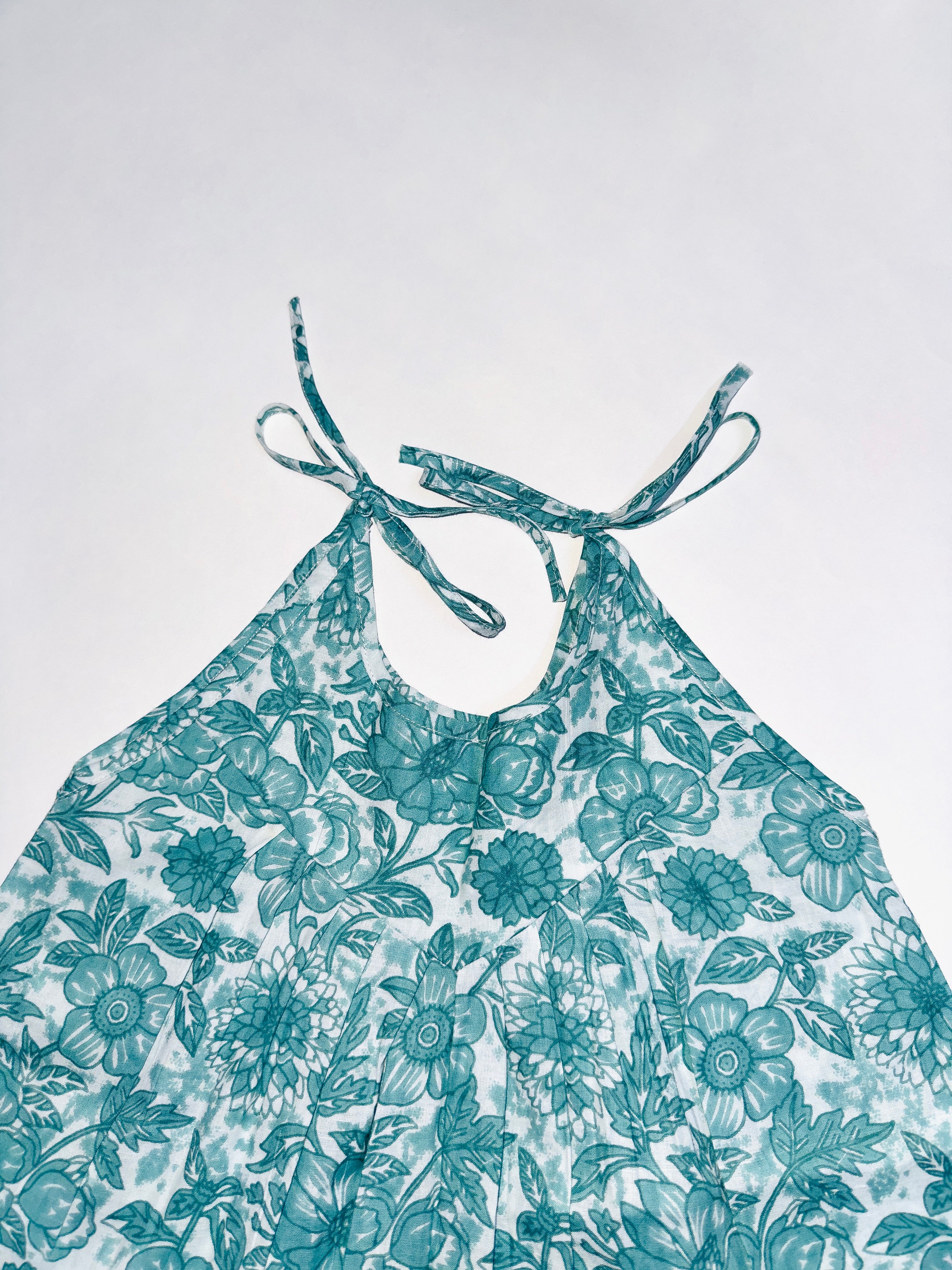 Girls floral neck blue floral top – front view