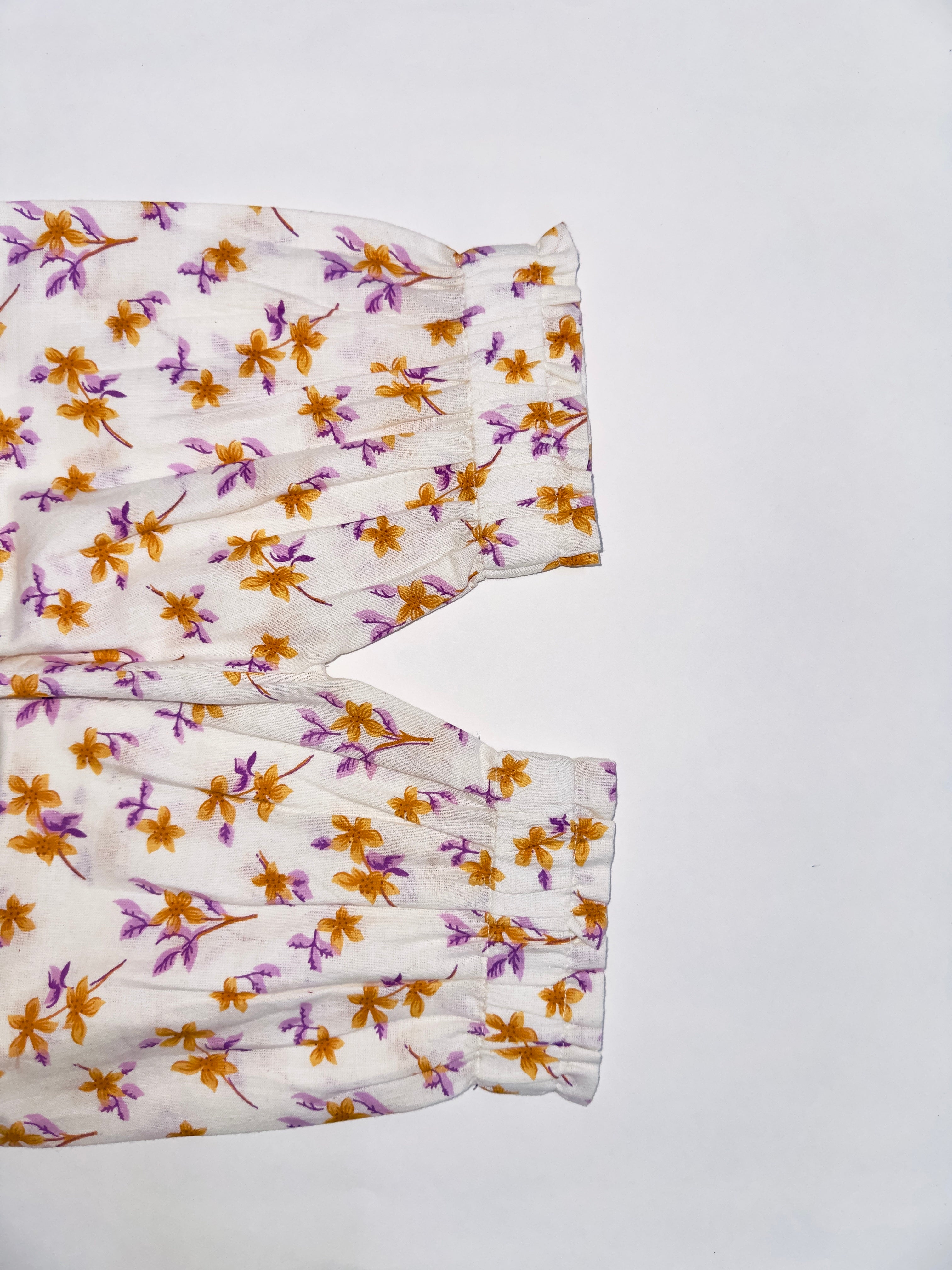 Sleeveless baby girl floral top with matching pants