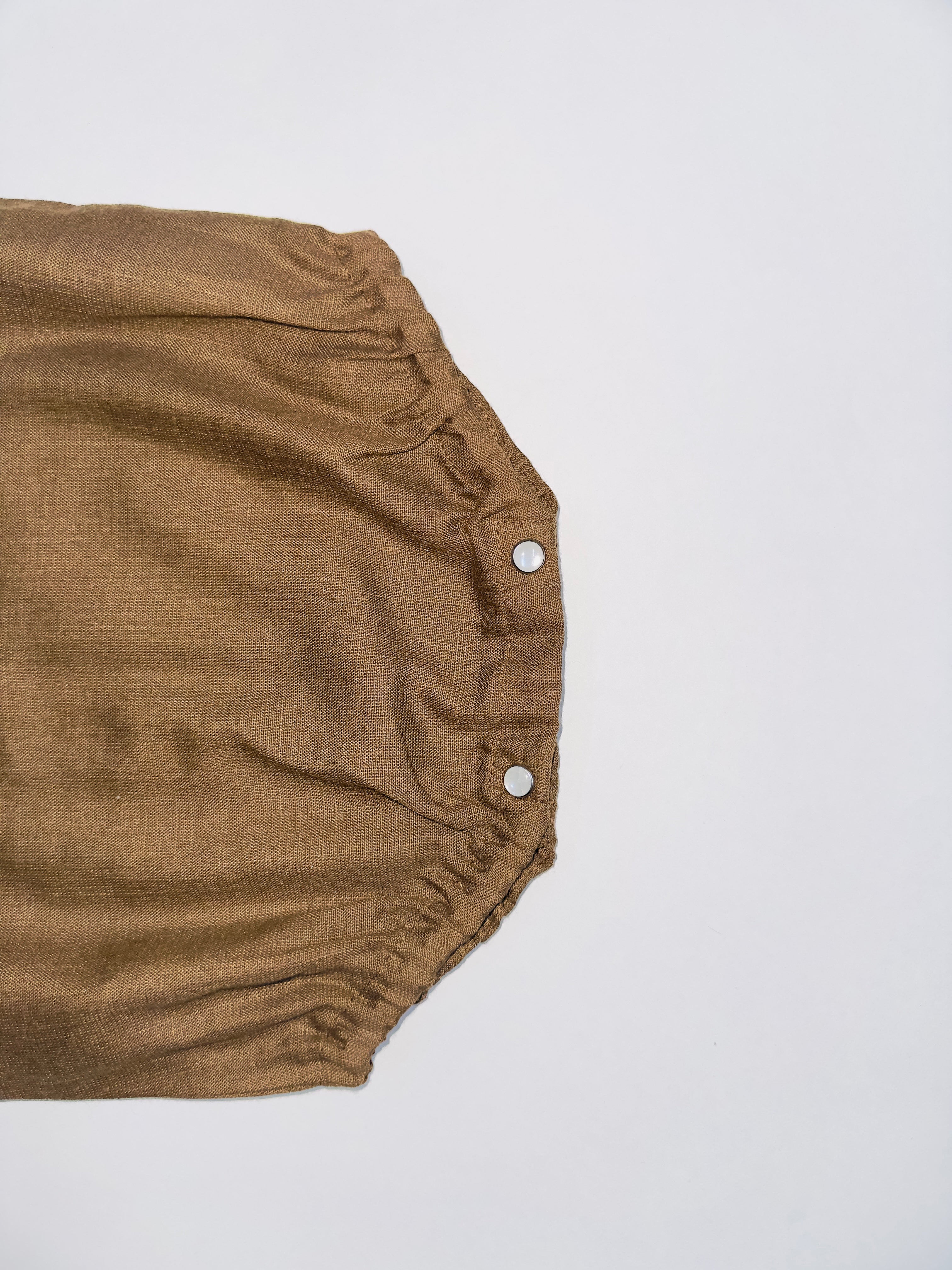 Brown Baby Romper with Wooden Buttons and Snap Closures for Newborns.