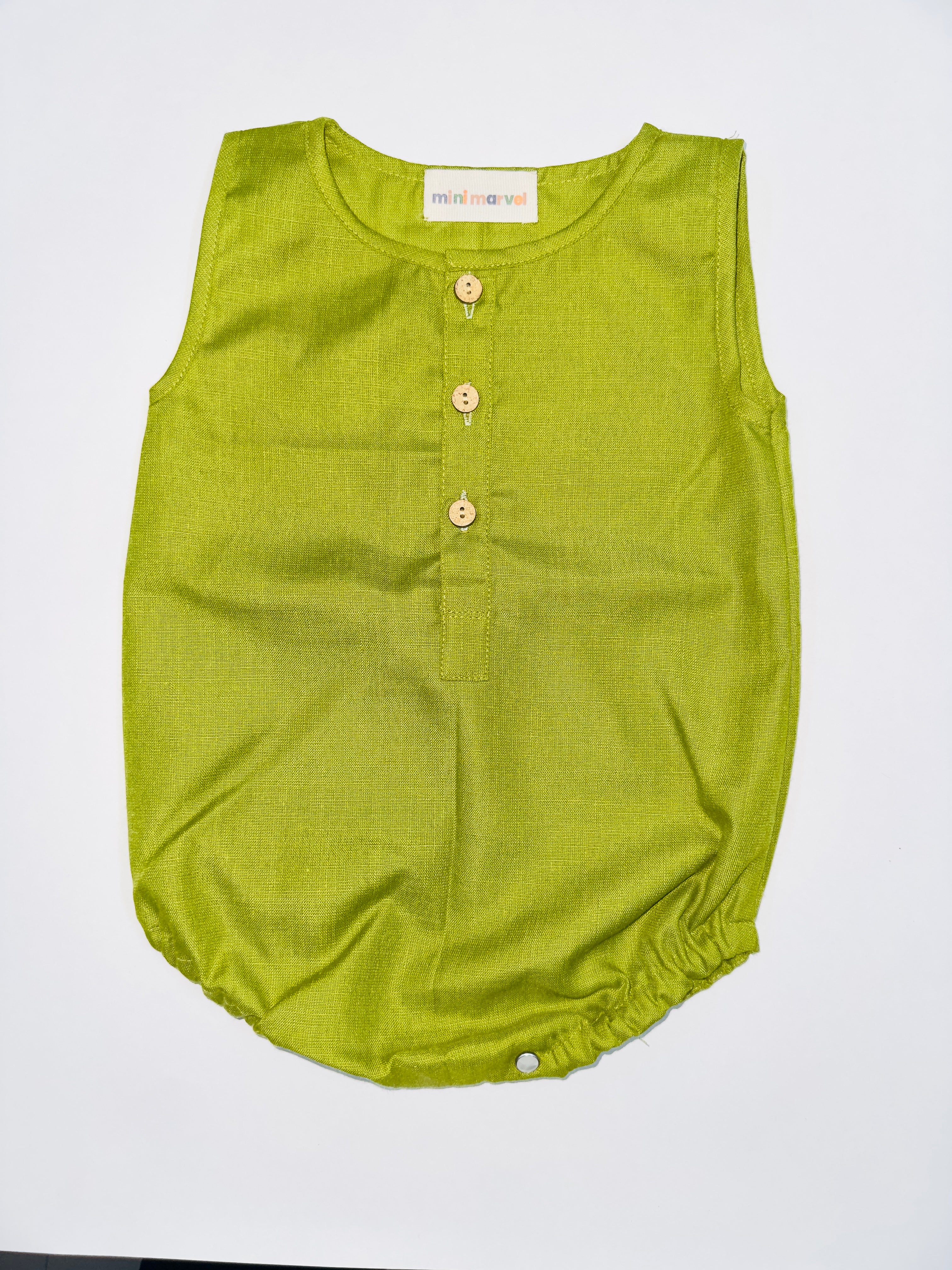 Olive Charm Baby Romper for Girls with Mustard Design and Wooden Button Details.
