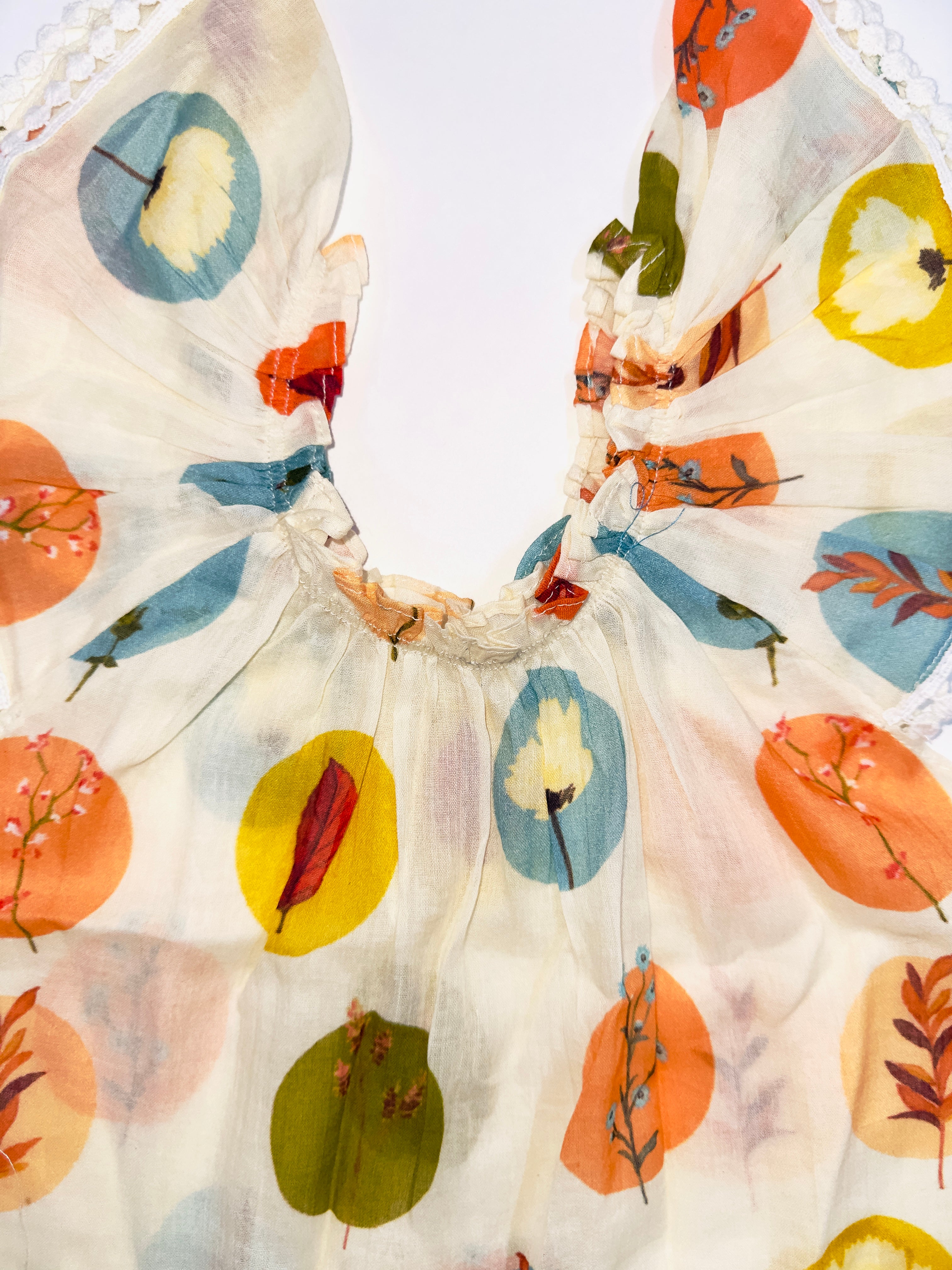 Polka Petals Dress for Girls with Vibrant Polka Dots and Ruffled Lace Sleeves.