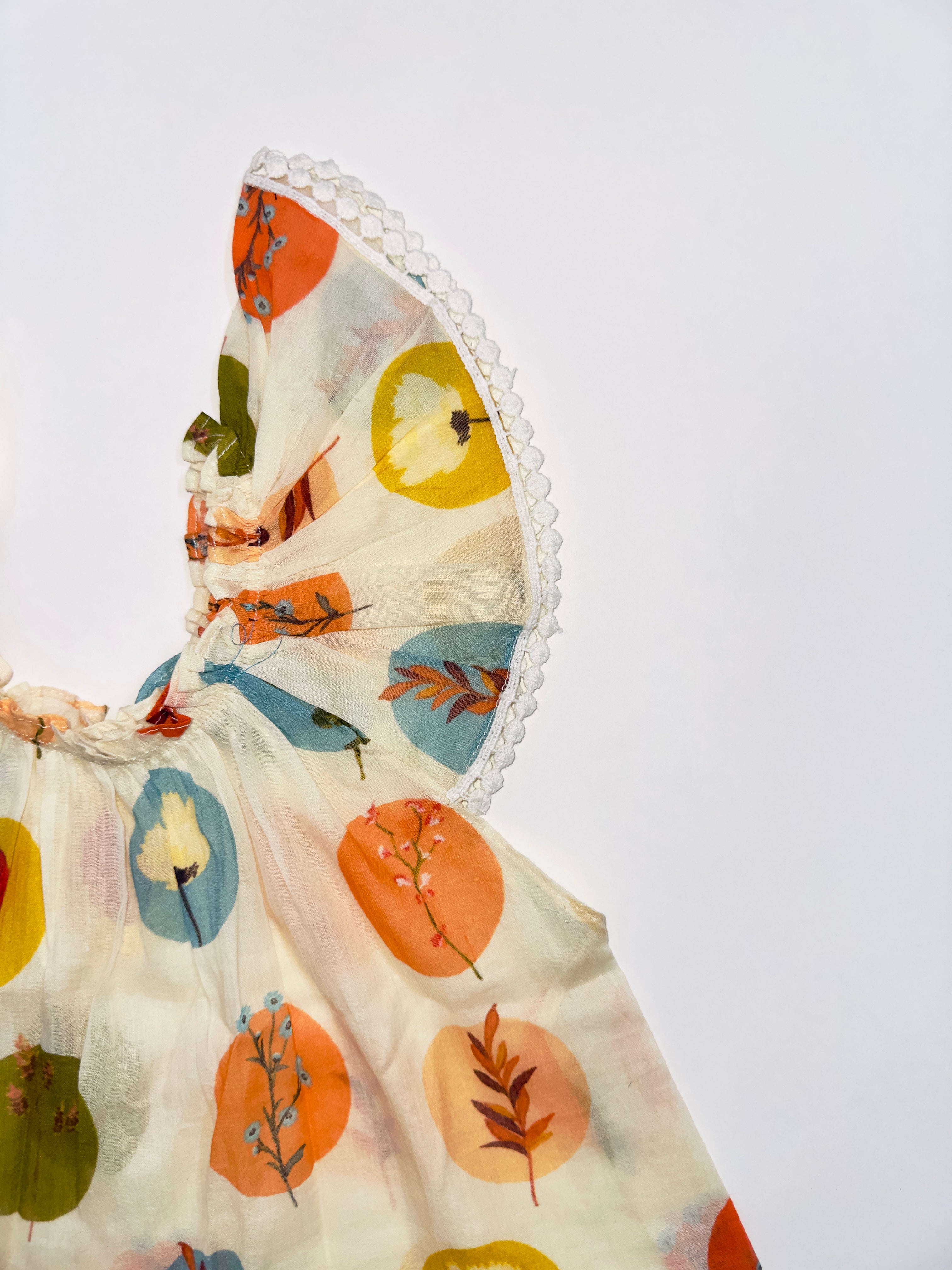 Polka Petals Dress for Girls with Vibrant Polka Dots and Ruffled Lace Sleeves.