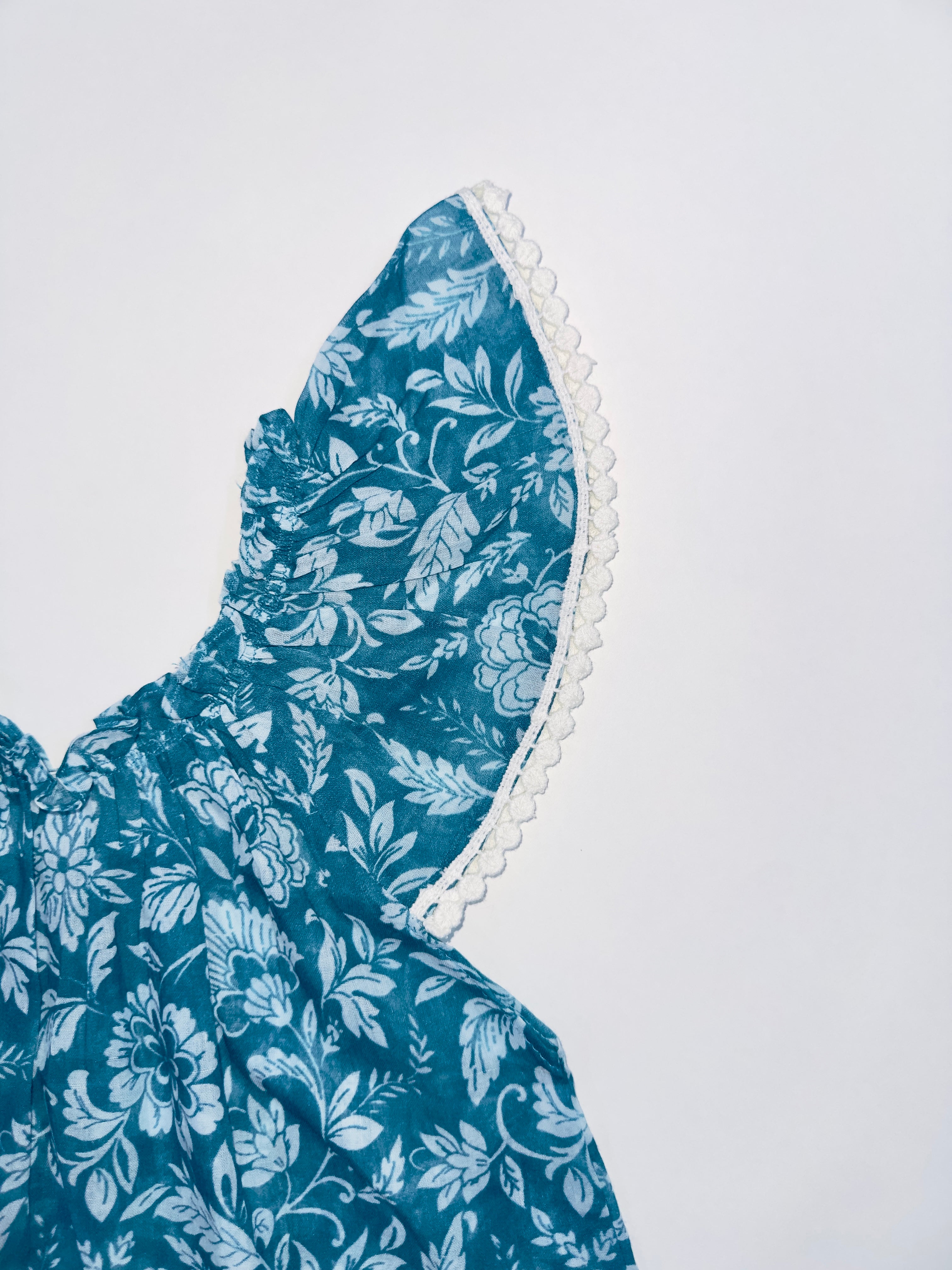 Blue Blossom Breeze Dress for Baby Girls with White Floral Print and Lace Sleeves