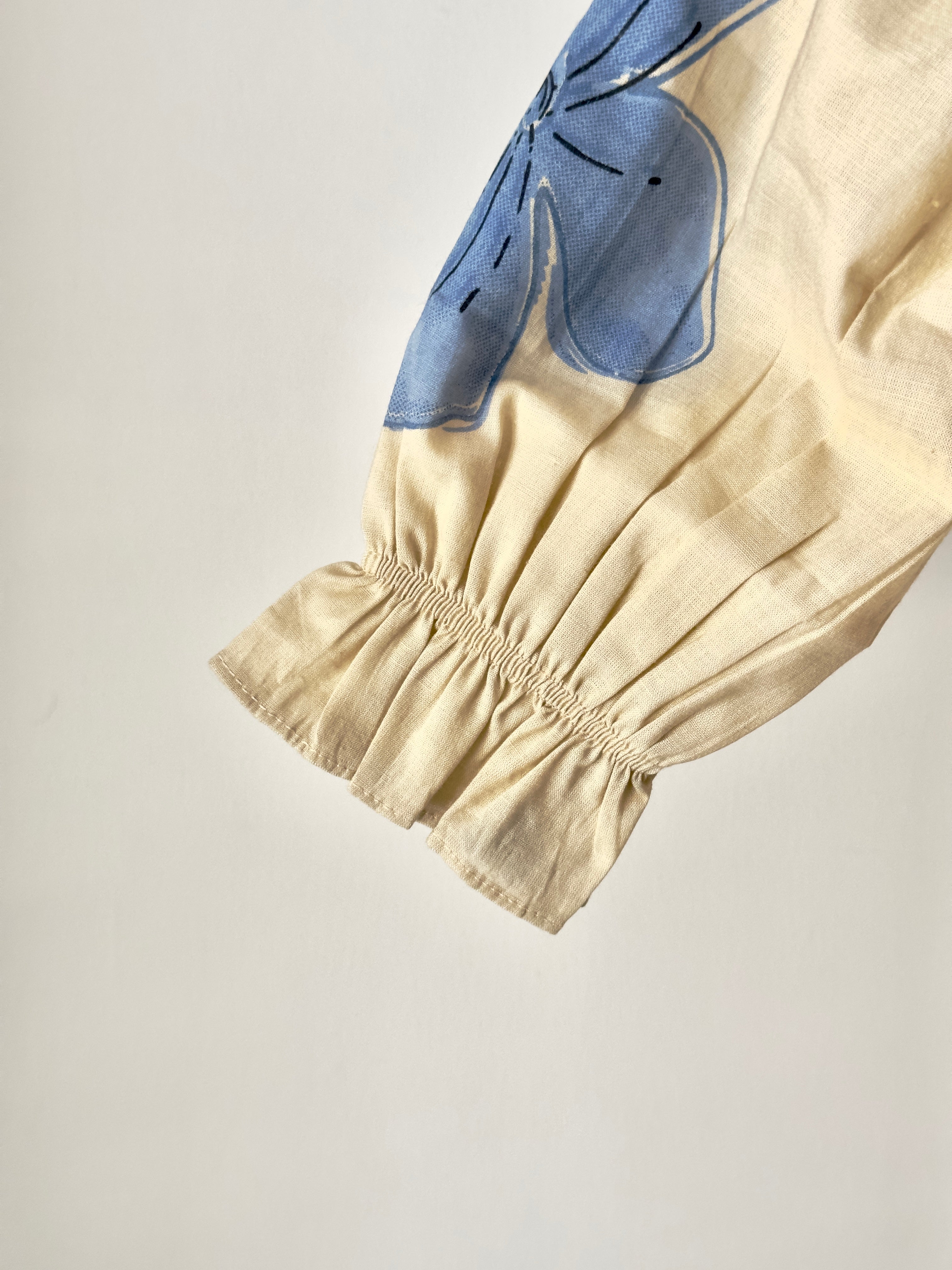 Baby girl floral ruffle co-ord set in cream and blue cotton