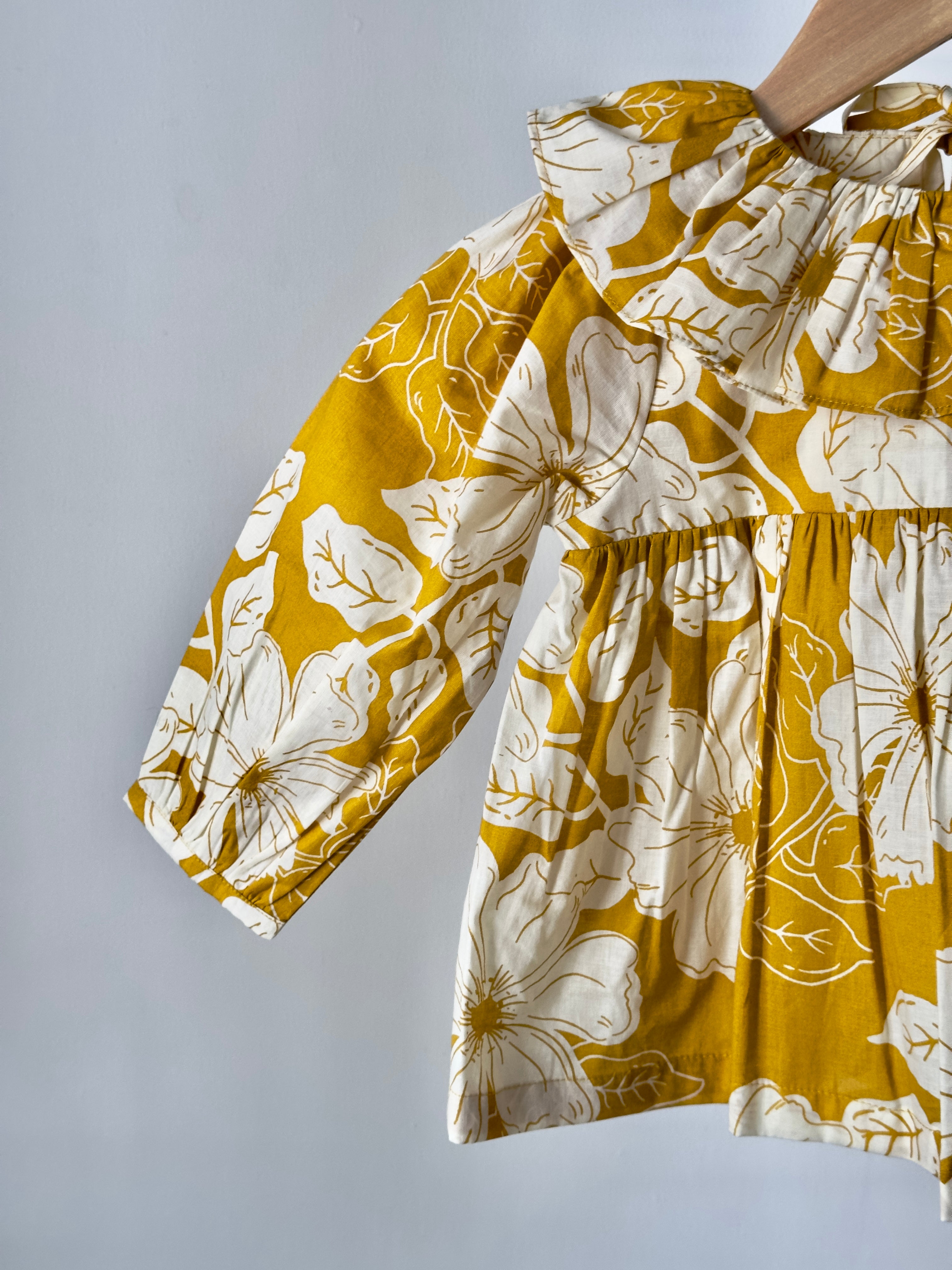 Ruffled neckline floral top with matching cream cotton bottoms