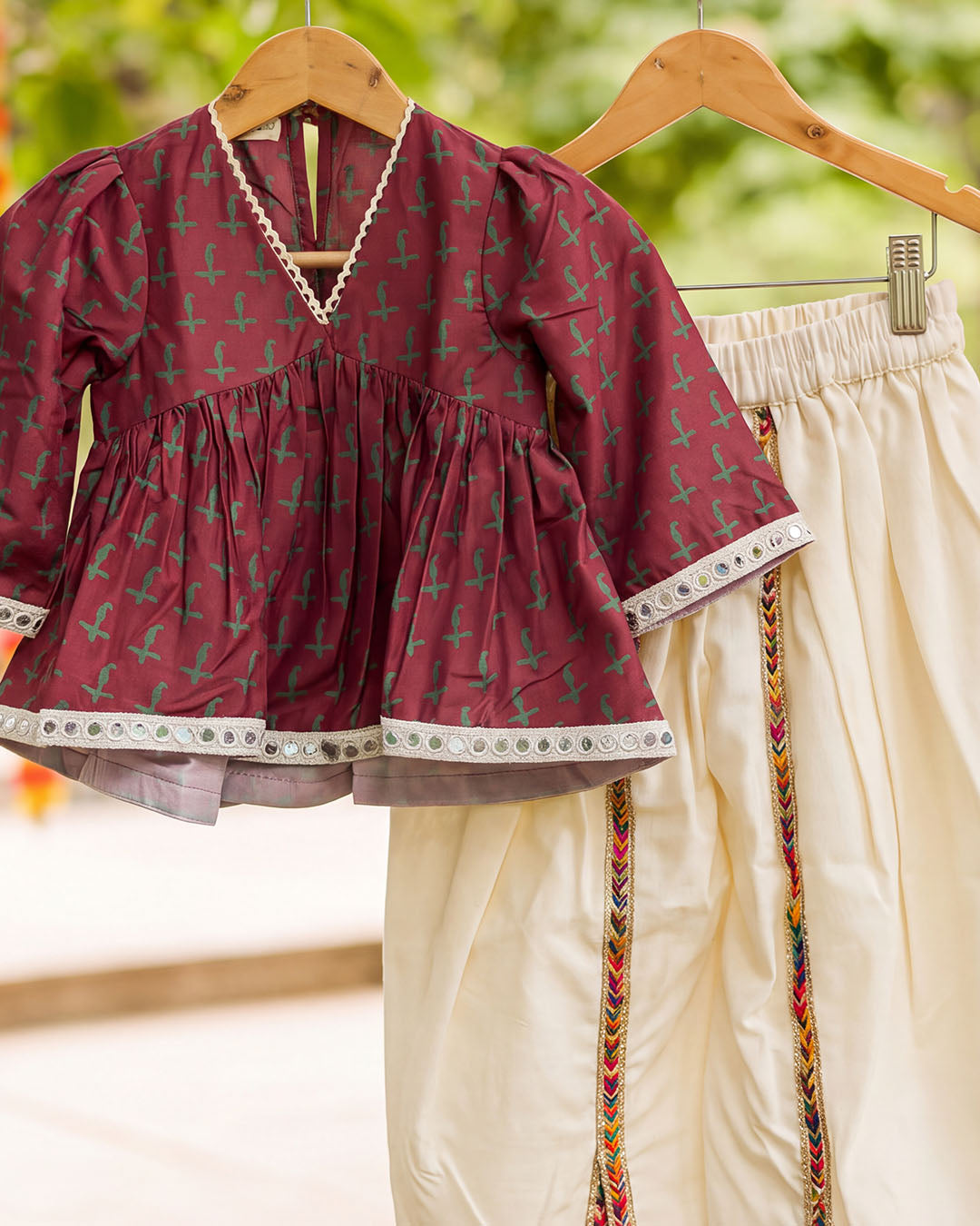 Wine Printed Girls Top off-White Dhoti Set