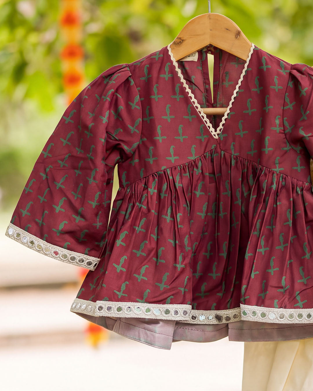Wine Printed Girls Top off-White Dhoti Set