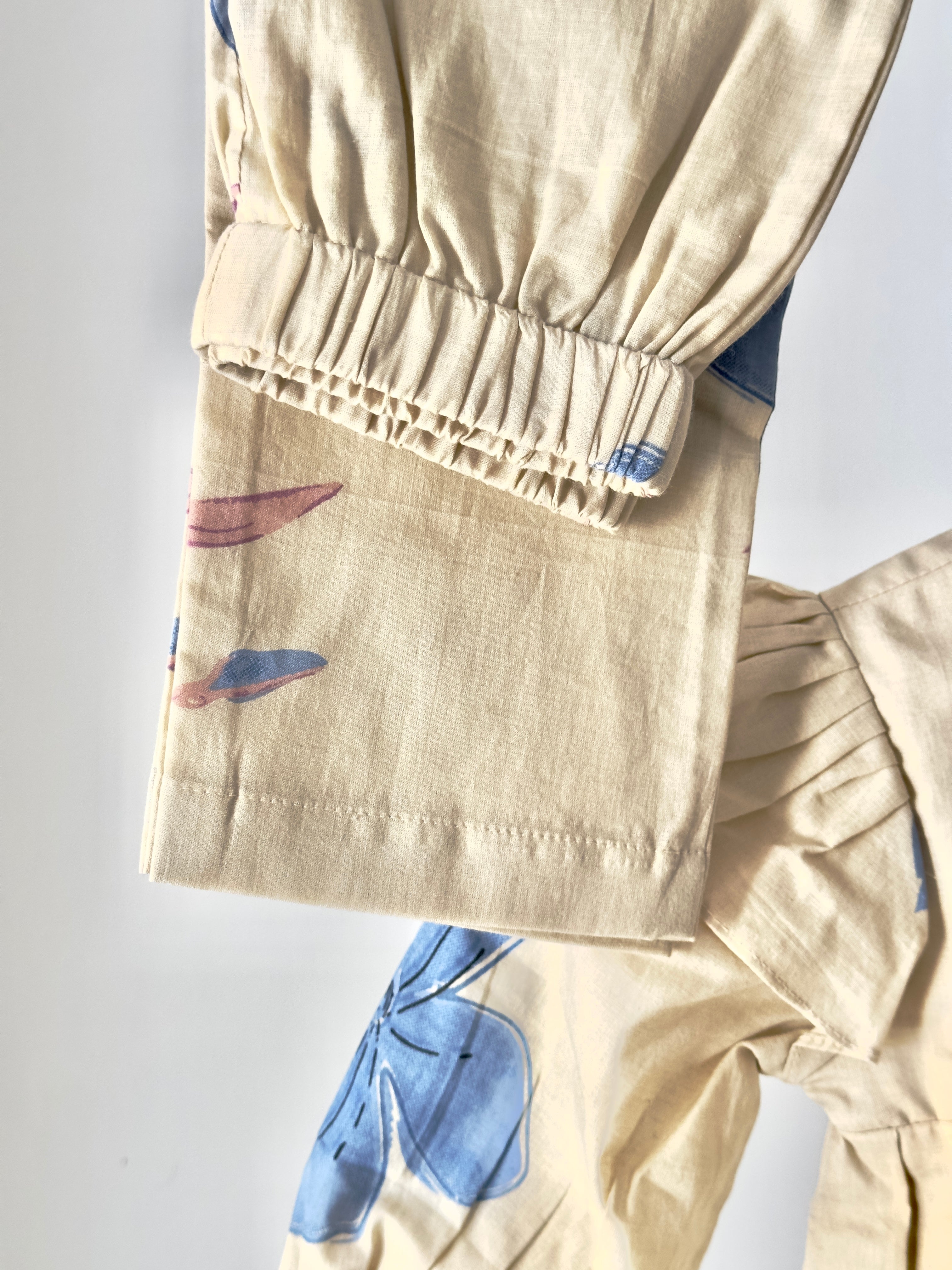 Baby girl floral ruffle co-ord set in cream and blue cotton